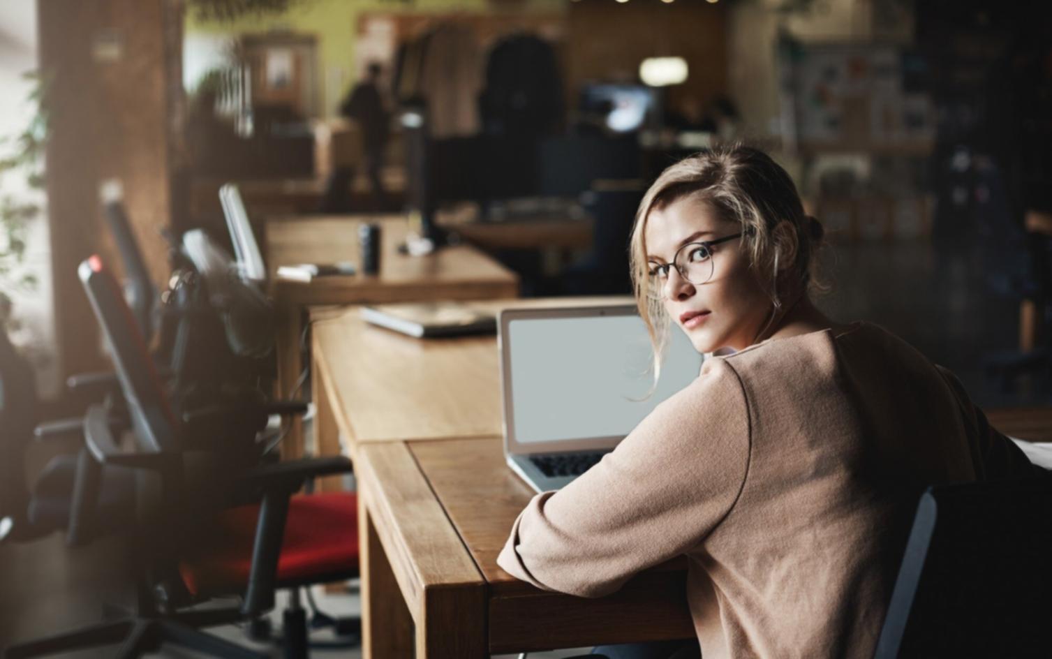 Professional analyzing blockchain financial data on multiple screens